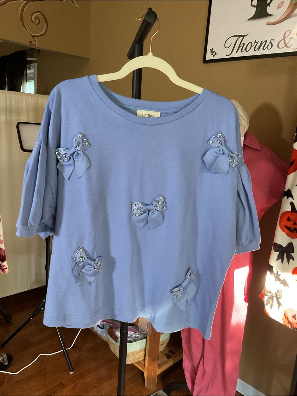 Umgee Light Blue Bow Accent Short Sleeve Top